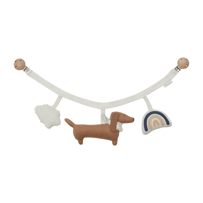 square_image3 Soft baby garland with a brown dachshund plush, knit cloud, and rainbow hanging from a curved fabric arch with wooden ends.